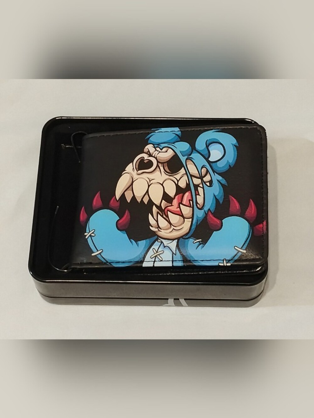 Buckle-Down Black Wallet with Blue Monster and Red Claws